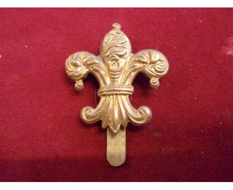 Manchester Regiment 7th (Ardwick) Battalion WWI Cap Badge (Gilding-metal), slider. K&amp;K: 1746