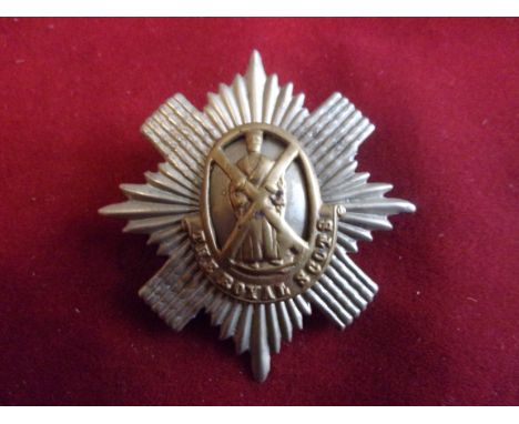 Royal Scots (1st Regiment of Foot) Victorian Glengarry Cap Badge (Bi-metal), two lugs, worn 1874 to 1881. Domed central devic