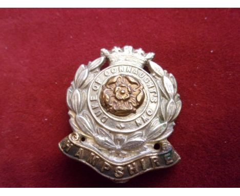 Hampshire Regiment 6th (Duke of Connaught's Own) Battalion WWI Other Ranks Cap Badge (Bi-metal), slider, second type with a s