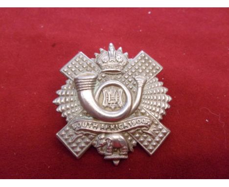 Highland Light Infantry 9th Glasgow Highland) Battalion Cap Badge (White-metal), two lugs with script. K&amp;K: 1750