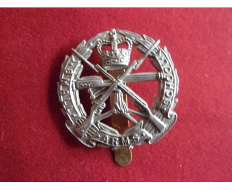 Small Arms School Corps EIIR Cap Badge (White-metal), slider. K&amp;K: 2141