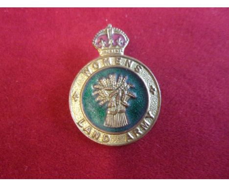 Women's Land Army WWII Cap/Lapel Badge (Gilt and enamel), brooch fitting and made H.W.M. These were given to Women who Volunt