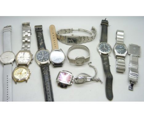 A collection of lady's and gentleman's wristwatches to include Storm, Swiss Military, Titan Edge, Citizen, etc.