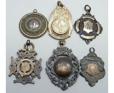 Five silver fob medals including one cricket and one other fob medal, (41g of silver)