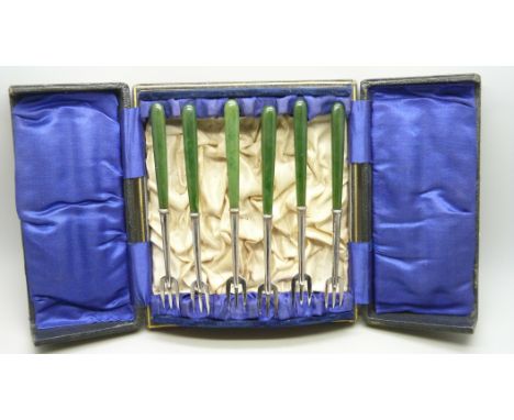 A cased set of six cocktail forks, silver and jade