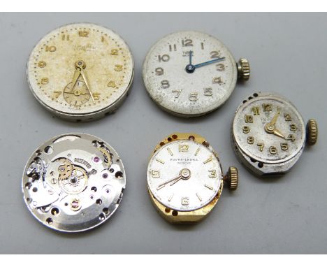 Three Tudor by Rolex wristwatch movements, one with missing dial, an International Watch Co. (IWC) movement and a Favre-Leuba