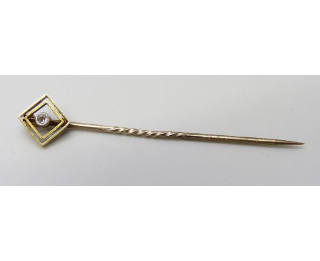 A 15ct gold and diamond stick pin 