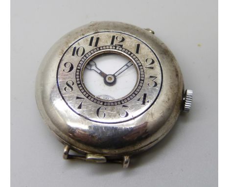 A silver half-hunter trench wristwatch, button release flip open case front, Glasgow import mark for 1916, 33mm case