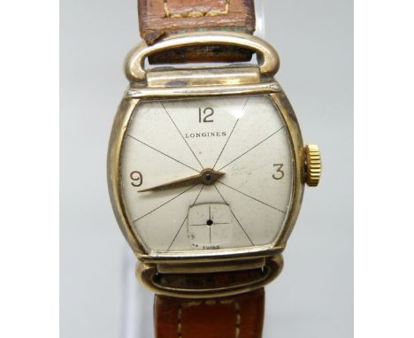 A 10ct gold filled Longines wristwatch, lacking second hand, 24mm case