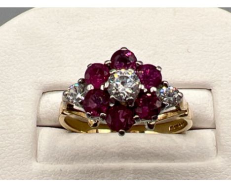 Ladies 9ct gold Ruby and cz cluster ring. 3.1g size O