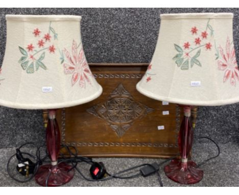 Vintage carved wooden twin handled tray together with a pay of Ruby effect based table lamps with shades