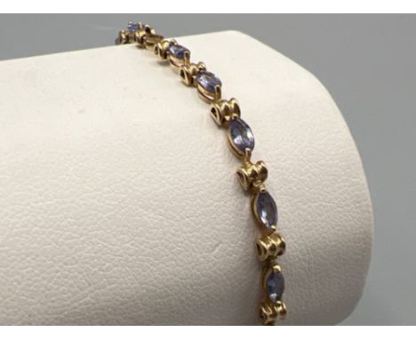 Ladies 9ct gold light purple stone set bracelet. 4.3G