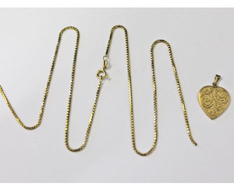 A 9ct gold heart shaped pendant and chain, gross wt. 8.1g.
