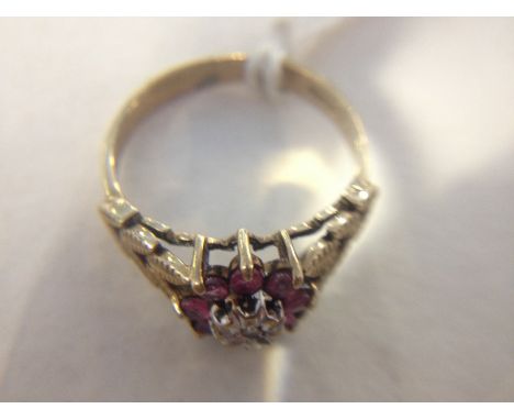 A 9ct gold diamond ruby ring, size O, gross wt. 2.9g.