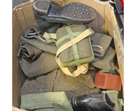 A large box of army clothes.