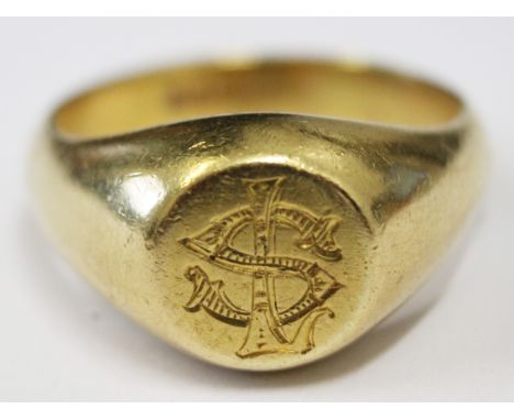 An 18ct gold signet ring, size W, wt. 16.9g.