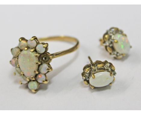 A pair of 9ct gold opal earrings and a 9ct gold opal ring, size P, gross wt. 4.8g.