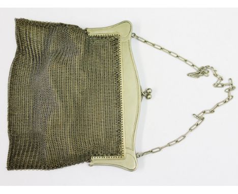 A white metal chain purse with leather interior, gross wt. 10oz.