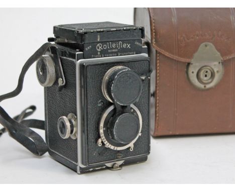 A Rolleiflex camera No116830 with leather case. Conditon - general wear throughout.