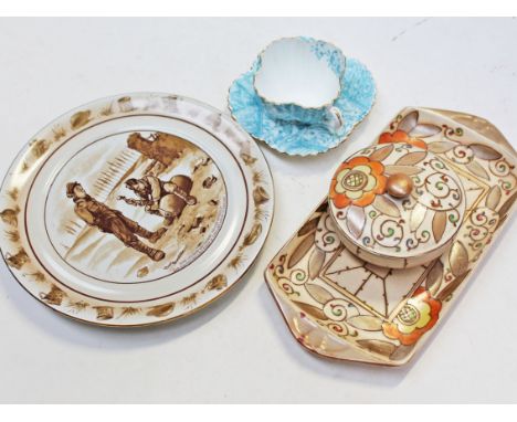 A mixed lot comprising a Wileman & Co cup and saucer, a Bruce Bainsfather plate and two pieces of Charlotte Rhead Burleigh Wa