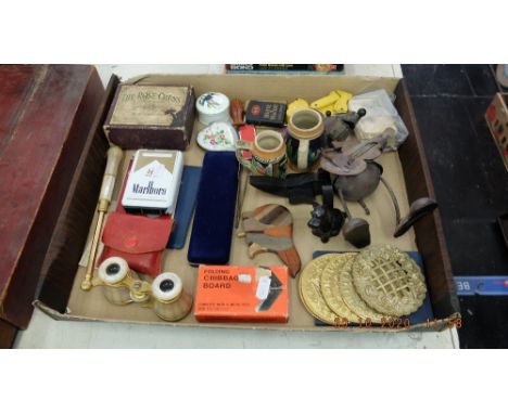 A box of interesting items inc. Opera glasses, a Mont Blanc pen and lead chess pieces