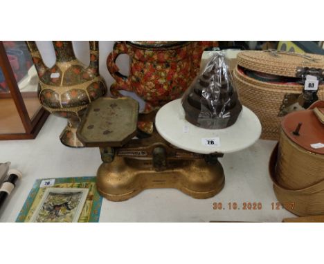 A set of scales and weights by C.W Breckwell Ltd.