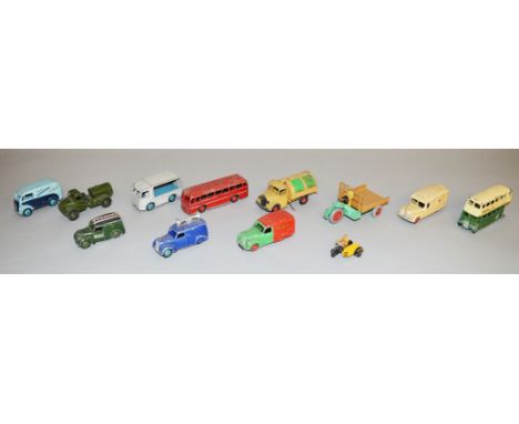 Twelve unboxed Dinky Toys diecast models with varying degrees of play wear, including a 465 Morris Van 'Capstan', a 470 Austi