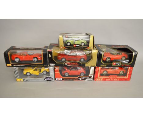 Seven 1:18 scale diecast models by Maisto, Bburago and similar, including Ferrari models. Boxed, G.