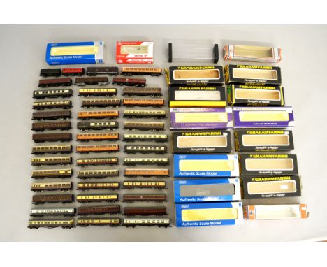 N Gauge. A quantity of unboxed Railway Carriages by Graham Farish, Peco, Dapol, Lima etc. together with a quantity of empty b