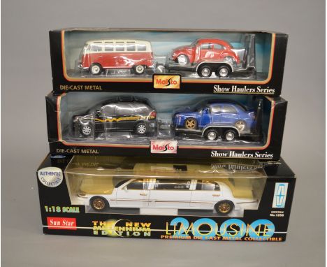 Three large scale diecast models: Sun Star The New Millennium Edition 2000 Lincoln Limousine 1:18 scale; two Maisto Show Haul