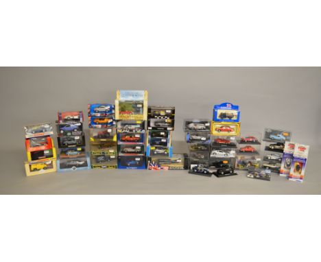 A quantity of  boxed diecast models by Corgi, Autoart, Universal Hobbies and others including some Racing Car models by Quart