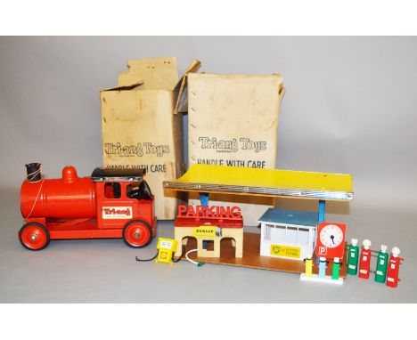 A boxed Tri-ang Pressed Steel  'Baby Puff Puff Engine' in red/black with red metal wheels and rubber tyres with large Tri-ang
