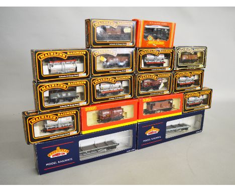 OO Gauge. Sixteen boxed items of Rolling Stock including eleven Mainline and three Hornby Wagons together with two Bachmann 3