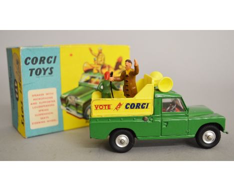 Corgi 472 Public Address Vehicle diecast model, in yellow and green with red interior, spun hubs and two figures. Model is G+