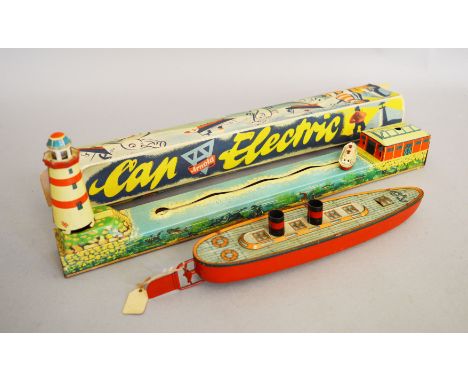 An boxed vintage tinplate clockwork 'Car Electric' model, by Arnold (Germany), approximately 37.5cm long, consisting of a boa