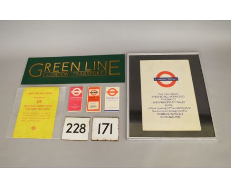 A selection of London Transport related items including a framed original Carriage Card removed from the interior of the trai