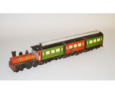 An unboxed vintage tinplate clockwork rigid  Floor Train model by OROBR (Germany), approximately 32cm long, with fixed key an