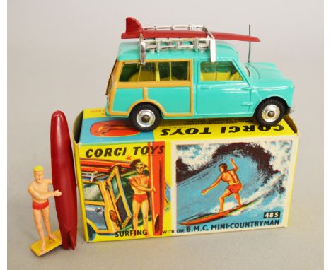 A boxed Corgi Toys diecast model, 485 'Surffing with the BMC Mini-Countryman' with surfer figure and two surfboards on roof r