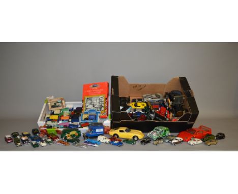 A good quantity of unboxed diecast models in a variety of different scales by Bburago Yatming, Saico, Lledo and others contai