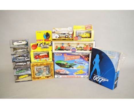 A quantity of packaged diecast models by Corgi, Matchbox and others, many of which are Film and TV related, The Monkees,  Thu