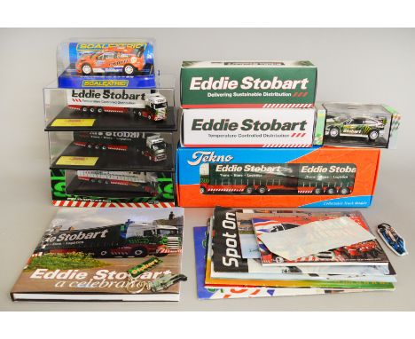 Quantity of Eddie Stobart related items: two Atlas diecast models; three Oxford Diecast models; Tekno 9932 1:50 scale; Saico 