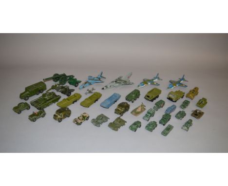A quantity of unboxed  diecast military and aircraft models by Dinky, Corgi and others  with varying degrees of play wear, . 