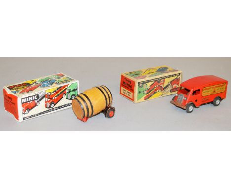 A boxed Tri-ang Minic clockwork toy, 'Short Bonnet Shutter Van' in red with 'Minic Transport' decals to both sides, missing k