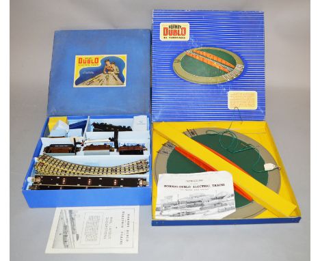OO Gauge. A boxed Hornby Dublo 3 Rail EDG7 0-6-2 Tank Goods Set including LMS engine '6917', three items of Rolling Stock, a 