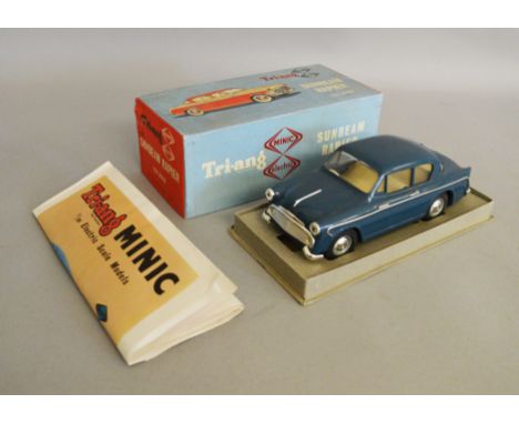 A boxed Tri-ang Minic Electric Sunbeam Rapier greyish blue plastic bodied battery operated car in 1:20 scale, does have damag