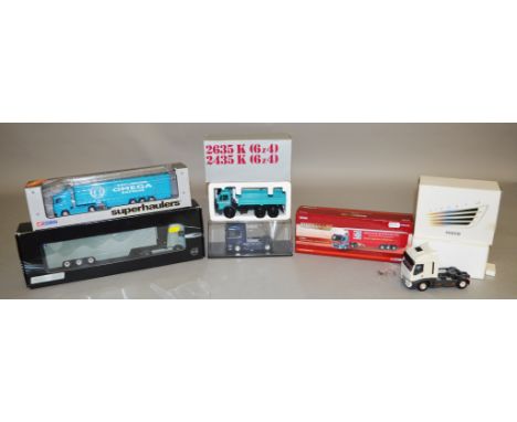 Six boxed diecast model trucks in a variety of scales by Corgi, Eligor and others including an NZG Mercedes 2635/2435 K tippe