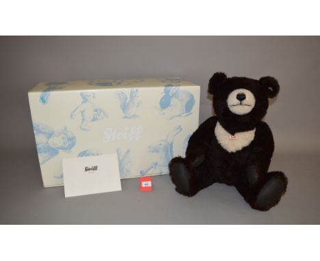 Steiff Teddy Bear Moon Ted, ltd.ed. 453/1500, dark brown and cream alpaca, height 60 cm. Boxed, with certificate and chest ta