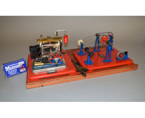 Stationary steam engine with various accessories, mounted on board, including grinder and polisher. Has been fired, includes 