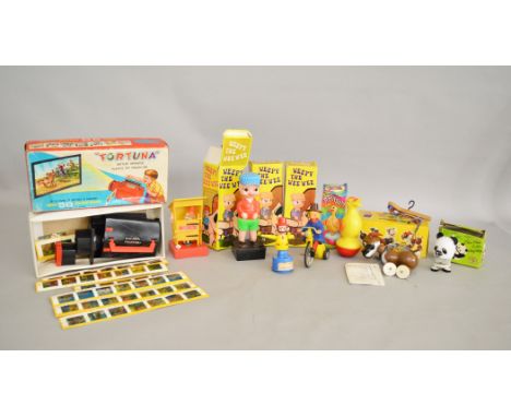 A mixed group of mainly boxed vintage  Hong Kong Plastic Toys including 3 x 'Weepy The Wee Wee' figures, a 'Fortuna Battery O