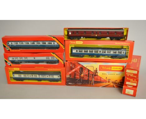 OO Gauge. Seven boxed Tri-ang and Hornby Coaches and a Utility Van, some in incorrect/incomplete boxes together with a boxed 